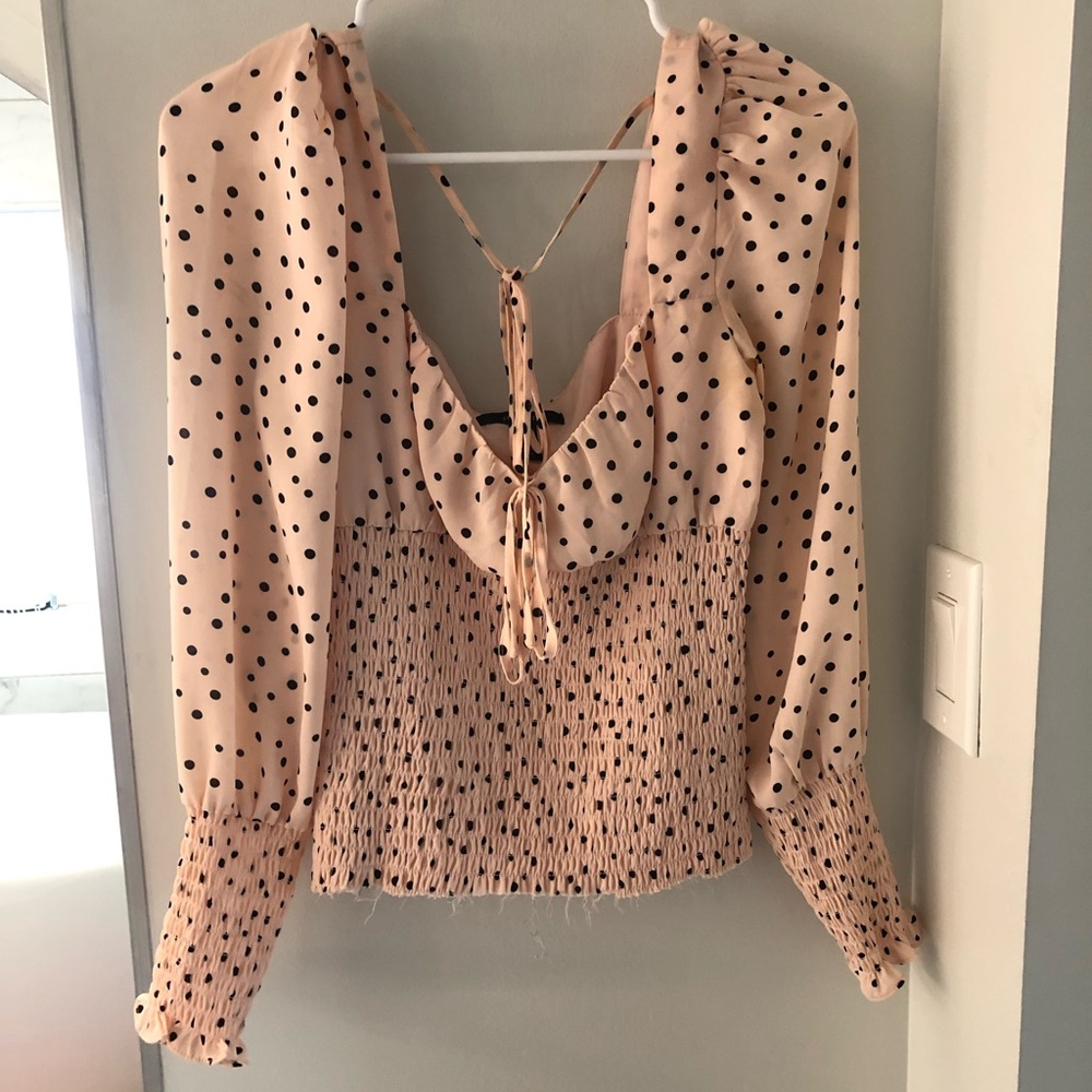 Pink and black polka dot top